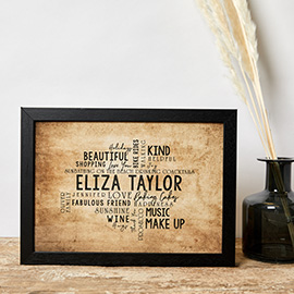 framed picture next to a quill